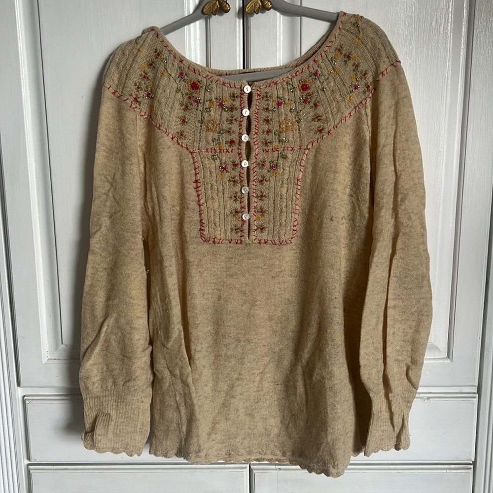 Free People embroidered sweater.